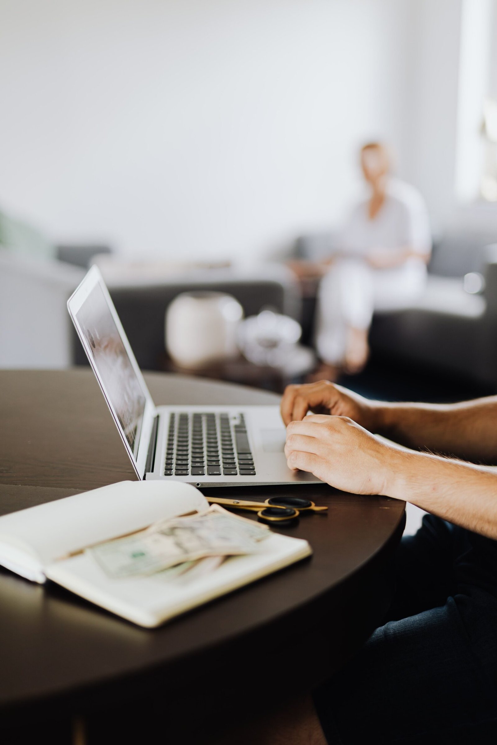 Person working as a virtual assistant on a laptop from home in Pakistan