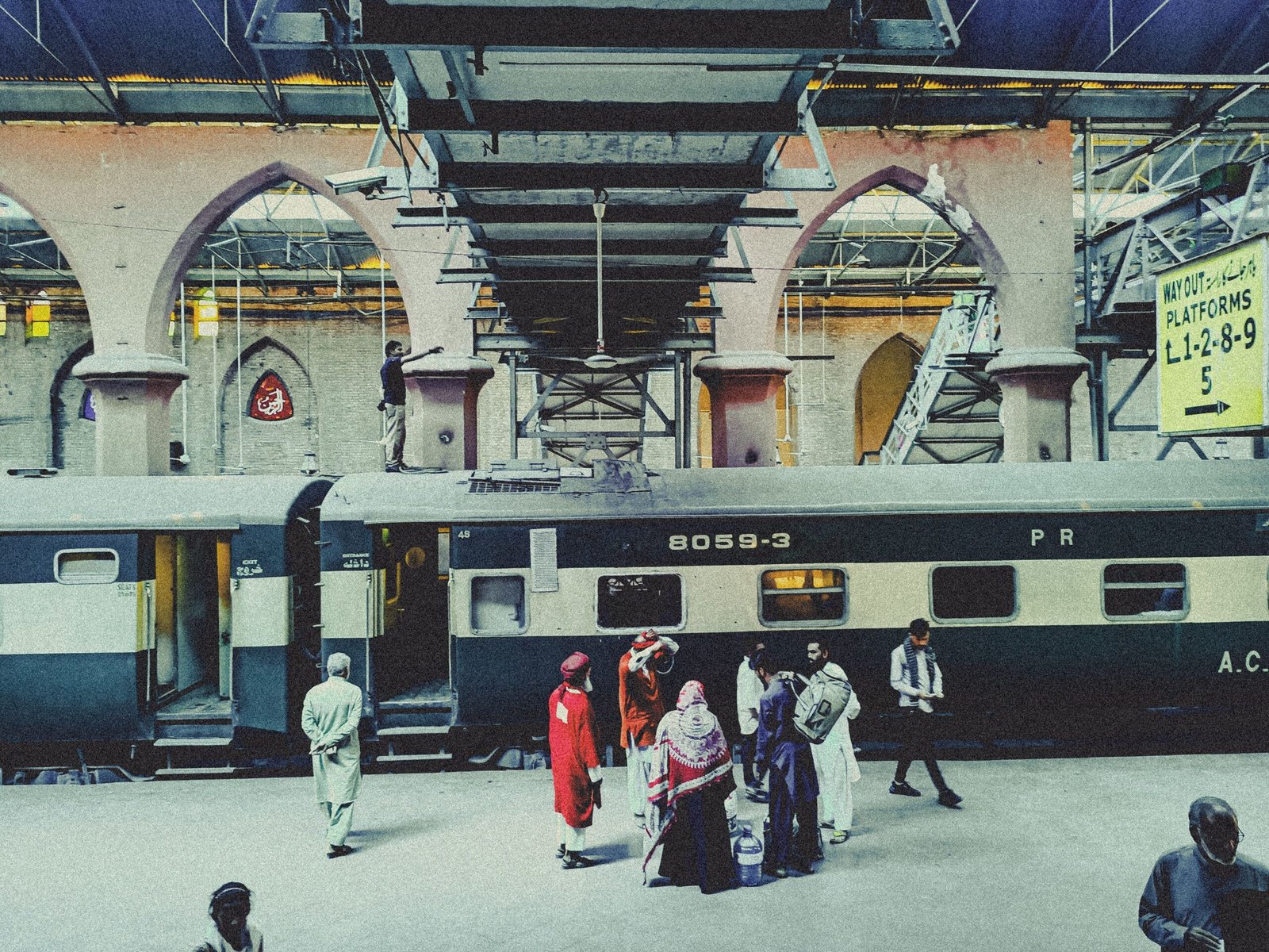 Passengers boarding a train at Lahore Railway Station, Pakistan