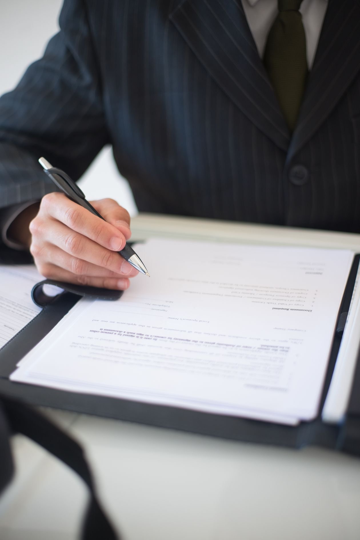 How to get an experience certificate for jobs in Pakistan - professional signing employment documents